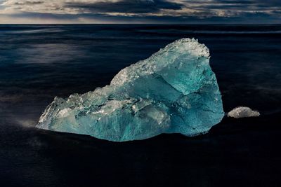 Close-up of ice crystals against sea