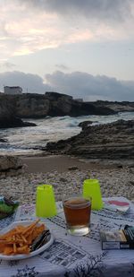 Scenic view of beach against sky