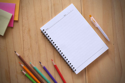 High angle view of colored pencils on table