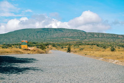 Scenic mountain against a cloudy sky, mount mount longonot, mount longonot national park, kenya.