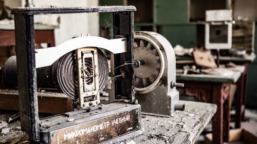 Close-up of old machinery in factory