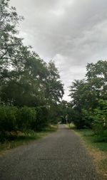 View of road against cloudy sky