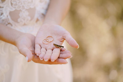 Close-up of woman holding hands