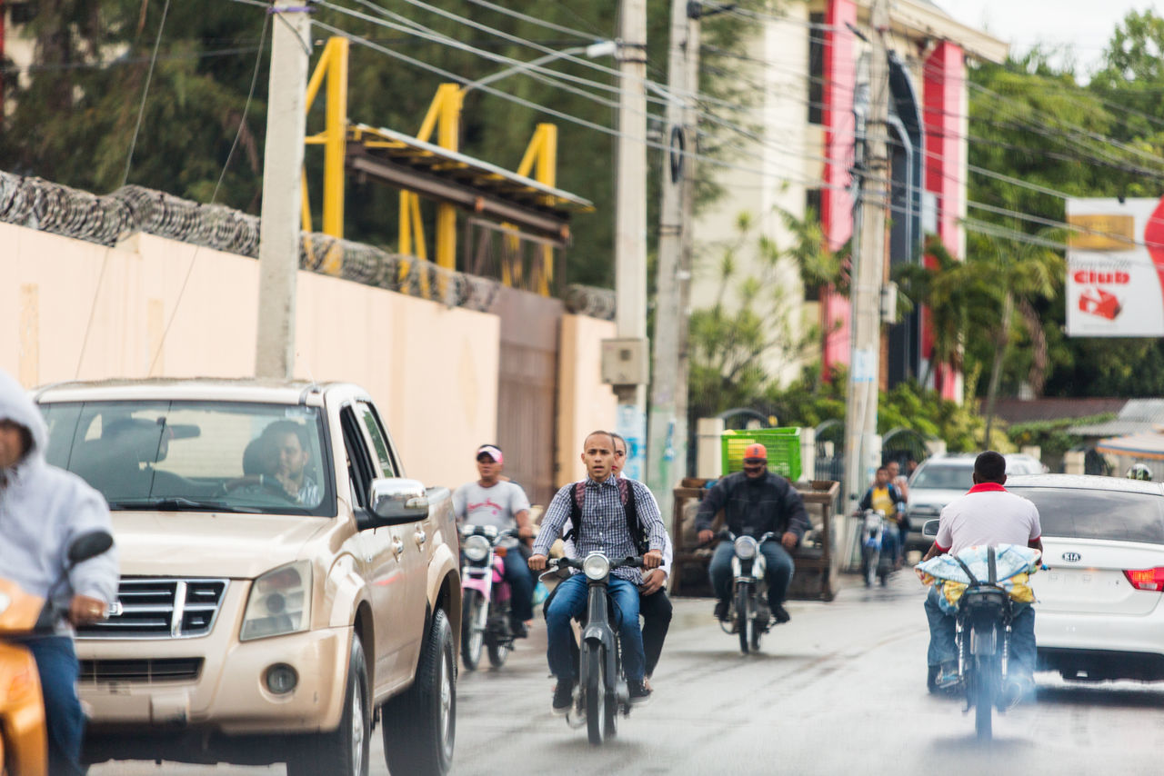 city, transportation, outdoors, city life, mode of transport, land vehicle, bicycle, women, adults only, people, day, yellow taxi, adult