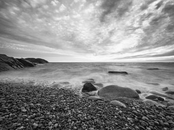 Scenic view of beach against sky
