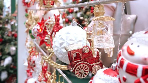 Close-up of christmas decoration hanging at market stall