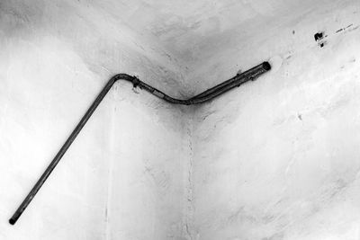 Low angle view of metallic wall