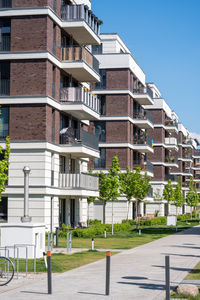 Low angle view of building against clear blue sky