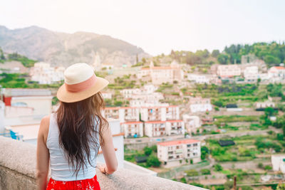 Woman looking at cityscape