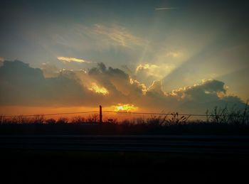 Scenic view of landscape at sunset