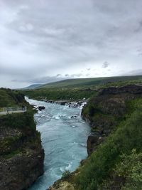 Scenic view of river against sky