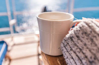 Close-up of coffee cup on table