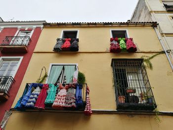 Low angle view of clothes drying in balcony