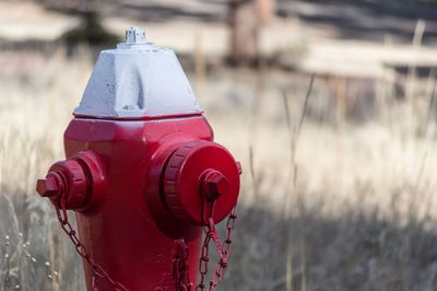 Close up of red fire hydrant against blurred background