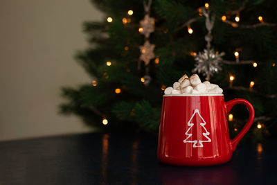 Close-up of text on christmas tree at night