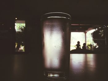Close-up of beer glass on table