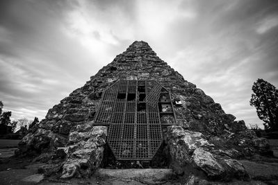 Low angle view of old building against sky