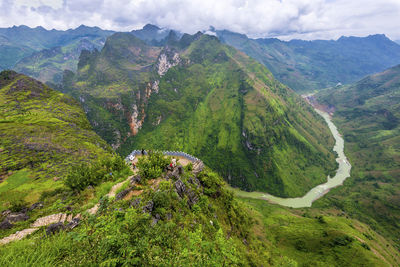 High angle view of trees and mountains against sky