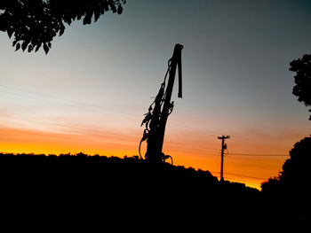 Silhouette of tree against sky during sunset