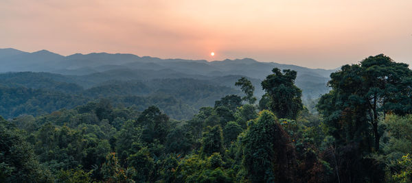 Scenic view of mountains against sky during sunset