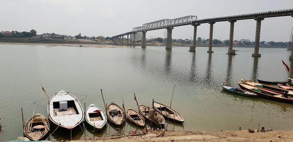 Panoramic view of bridge over majestic  river against sky