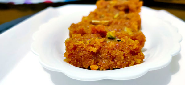 Close-up of served food in plate