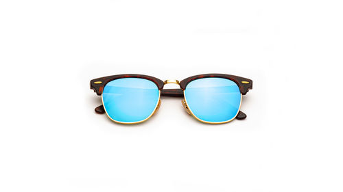 High angle view of sunglasses against white background