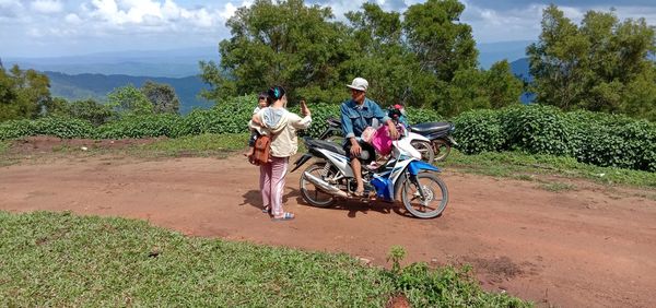 People riding bicycles on road