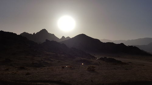 Scenic view of mountains against sky during sunset