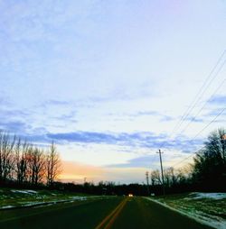 Road against sky during sunset