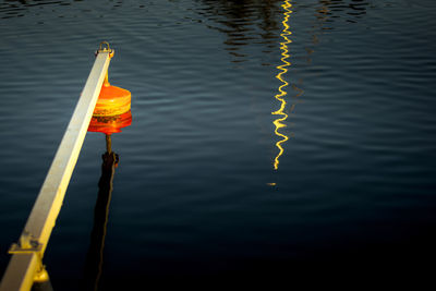 Close-up of yellow reflection in water