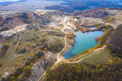 Aerial view of abandoned gypsum mine, quarry lake