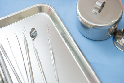 High angle view of dental equipment on table