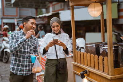 Young woman using mobile phone