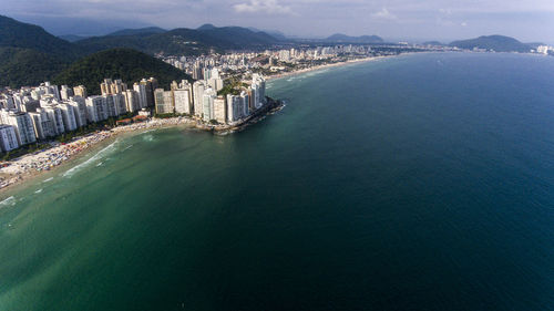 High angle view of sea and cityscape