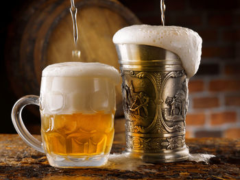 Close-up of beer glass on table
