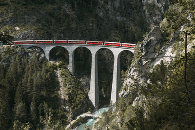 Arch bridge over river