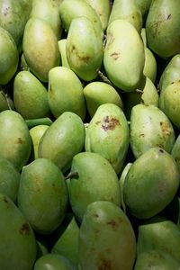 Full frame shot of green mango for sale in market