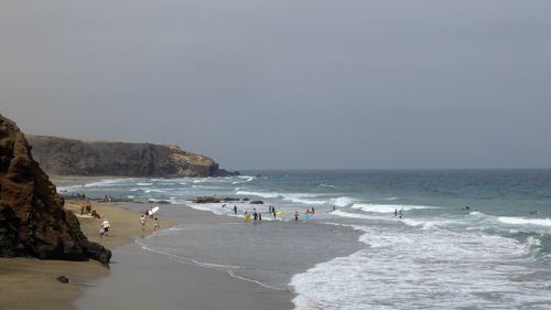 Scenic view of beach against clear sky