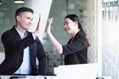 Portrait of business colleagues working at office