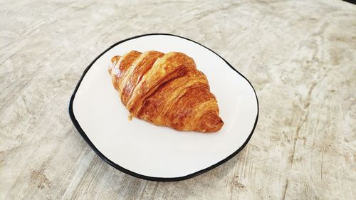 High angle view of bread in plate on table