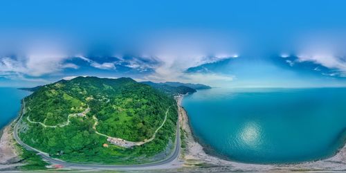 Panoramic view of sea and bay against sky