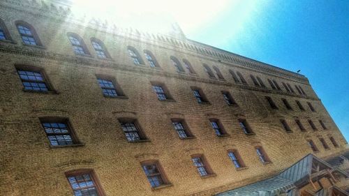 Low angle view of building against blue sky