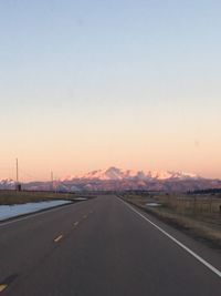 Empty road at sunset