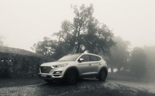 Car on road against clear sky