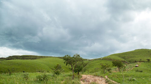 Scenic view of land against sky