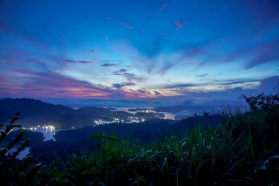 Scenic view of landscape against sky during sunset