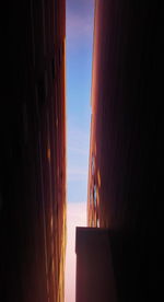 Buildings against sky during sunset