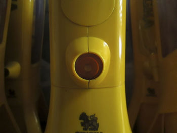 Close-up of yellow electric lamp