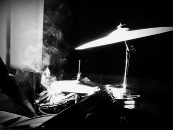 View of woman in dark room